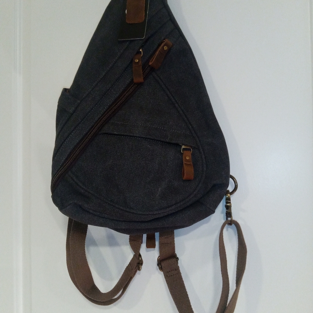 KL928 Sling Backpack Navy Blue Canvas with Brown Leather Trim Accents